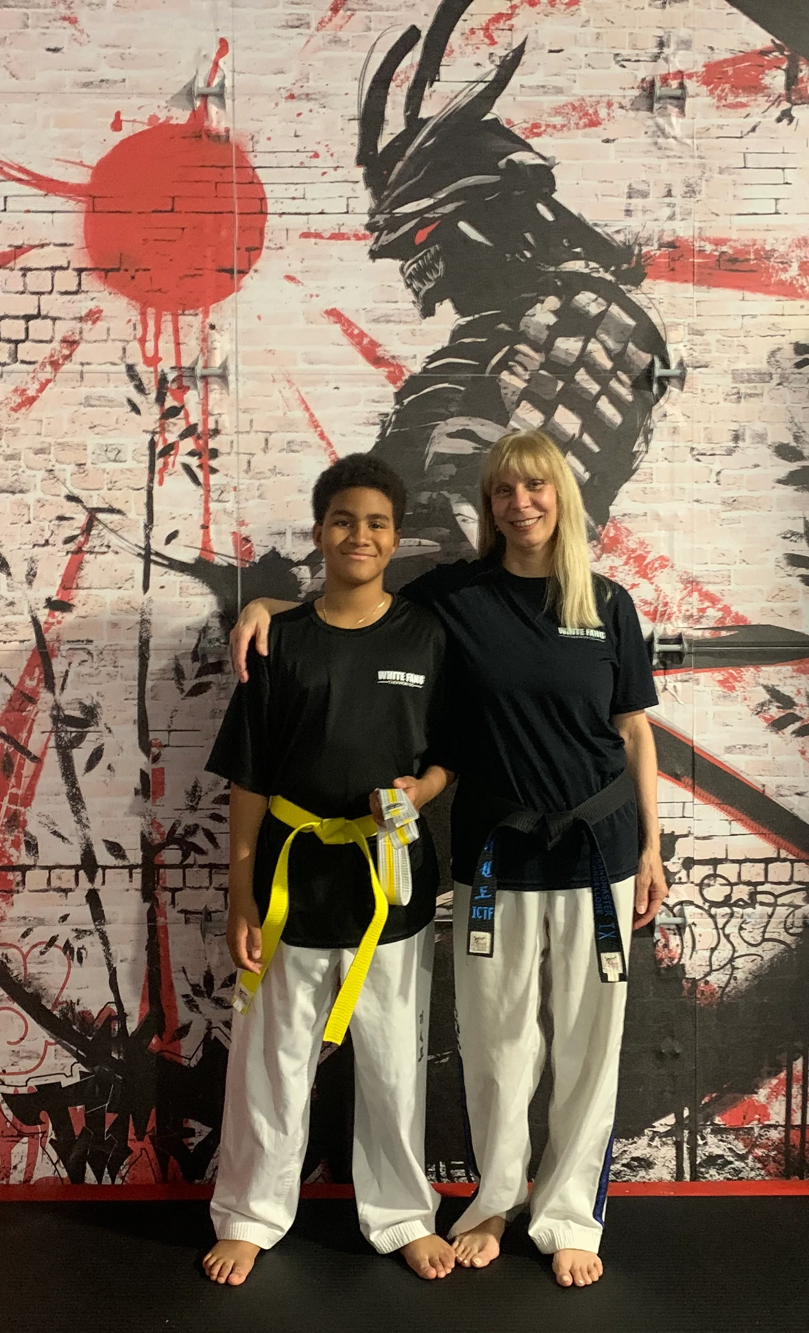 Woodbridge Taekwon-Do student Xavier with Grandmaster Scarsellone